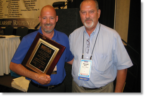 Photo of David Watson receiving the 2013 MSSA Agnew Condray Excellence Award from 2013 MSSA President Harold Miller.