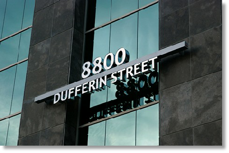 Photo of channel letters mounted over an exterior window
